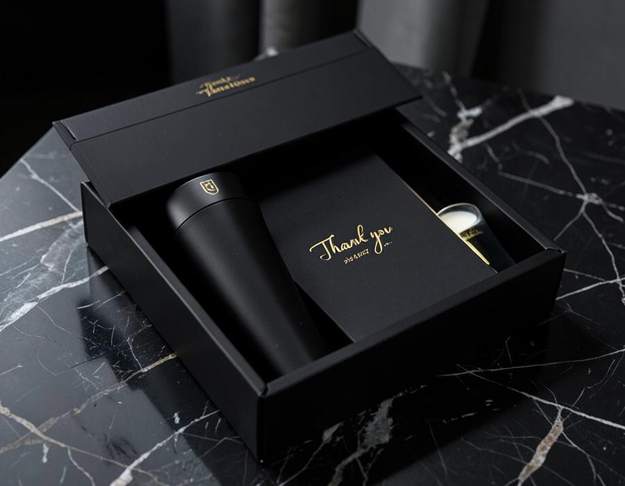 Black corporate gift set on marble