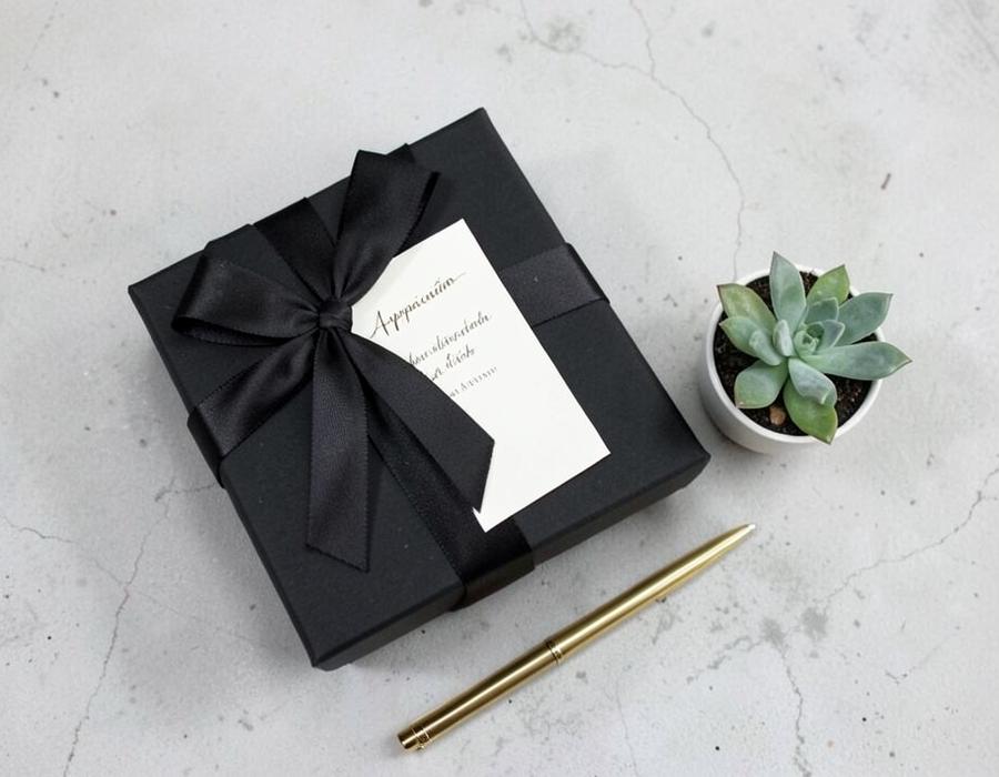 Black gift box with appreciation card and succulent